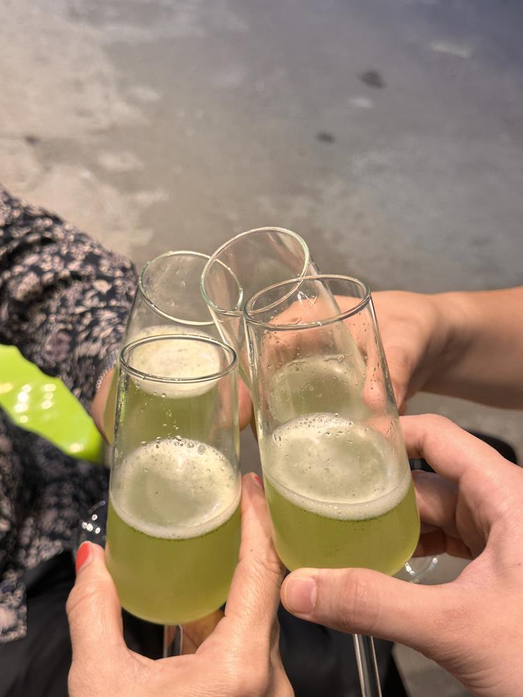 Cheers with green drinks