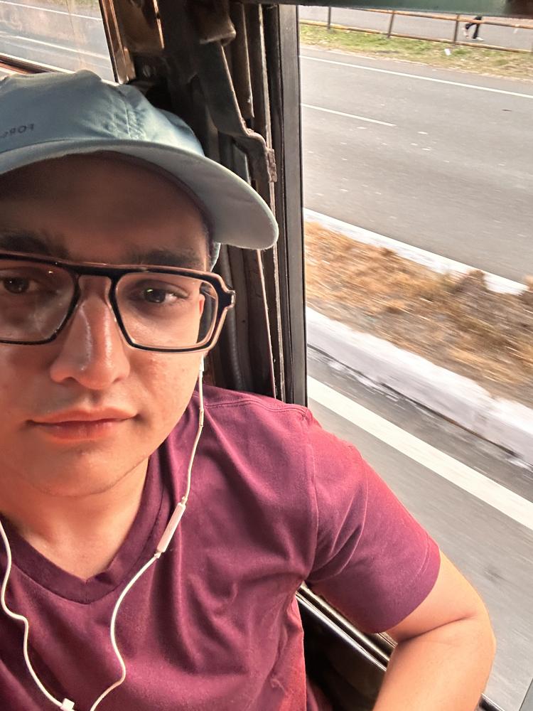Bus window selfie cap