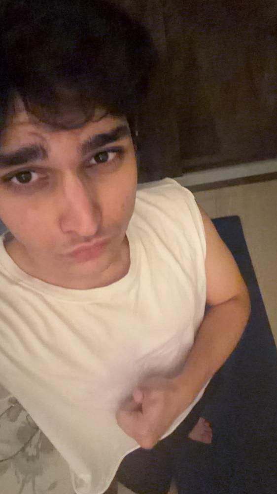 Selfie white tank from above