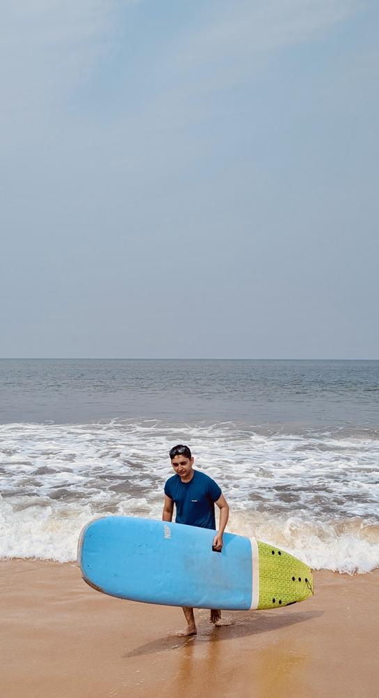 Carrying blue board far