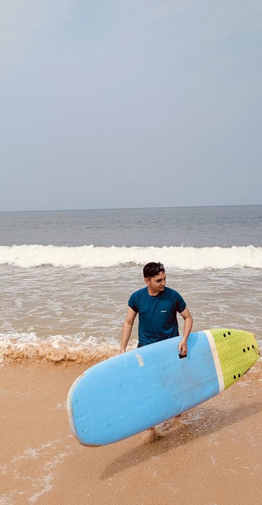 Carrying blue board close