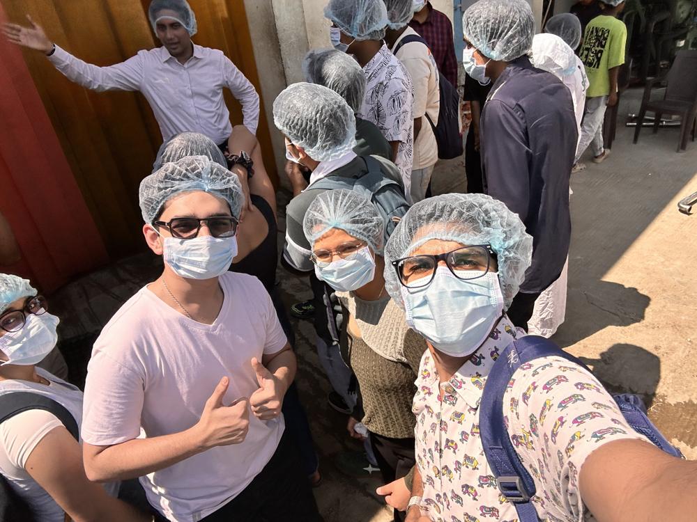 Sids farm tour group in hairnets